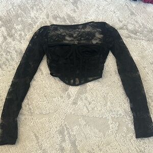 Black corset going out top